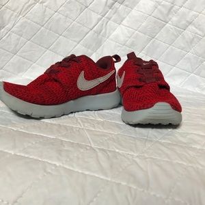 Boys size 10 Nike red slip-on shoes